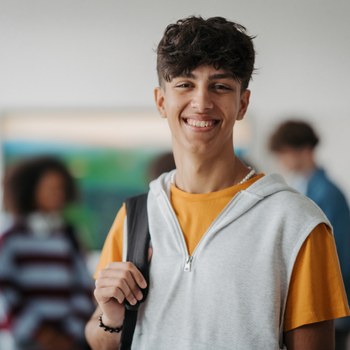 Smiling student with backpack